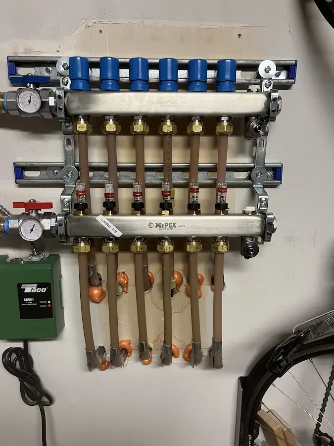 Plumber performing Water Heater Repair at a residential property in Goodview